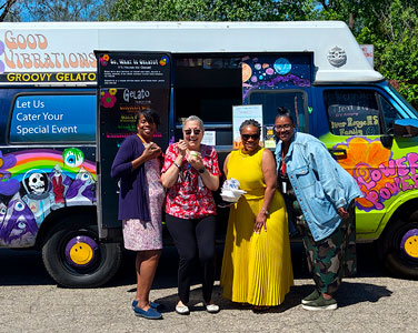 Women in front of gelato truck at event