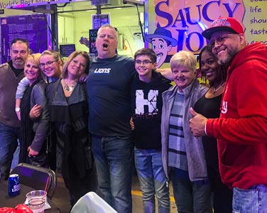 Family and Friends having fun at Saucy Joe's Food Truck