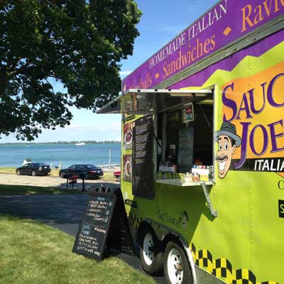 Saucy Joe's Food Truck parked at Metro Detroit Park