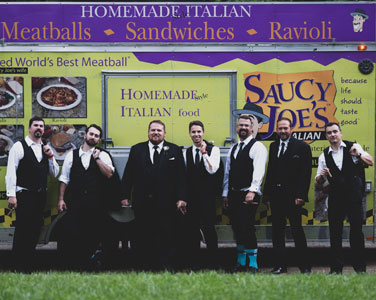 Groom with Groomsmen in front of Saucy Joe's Food Truck